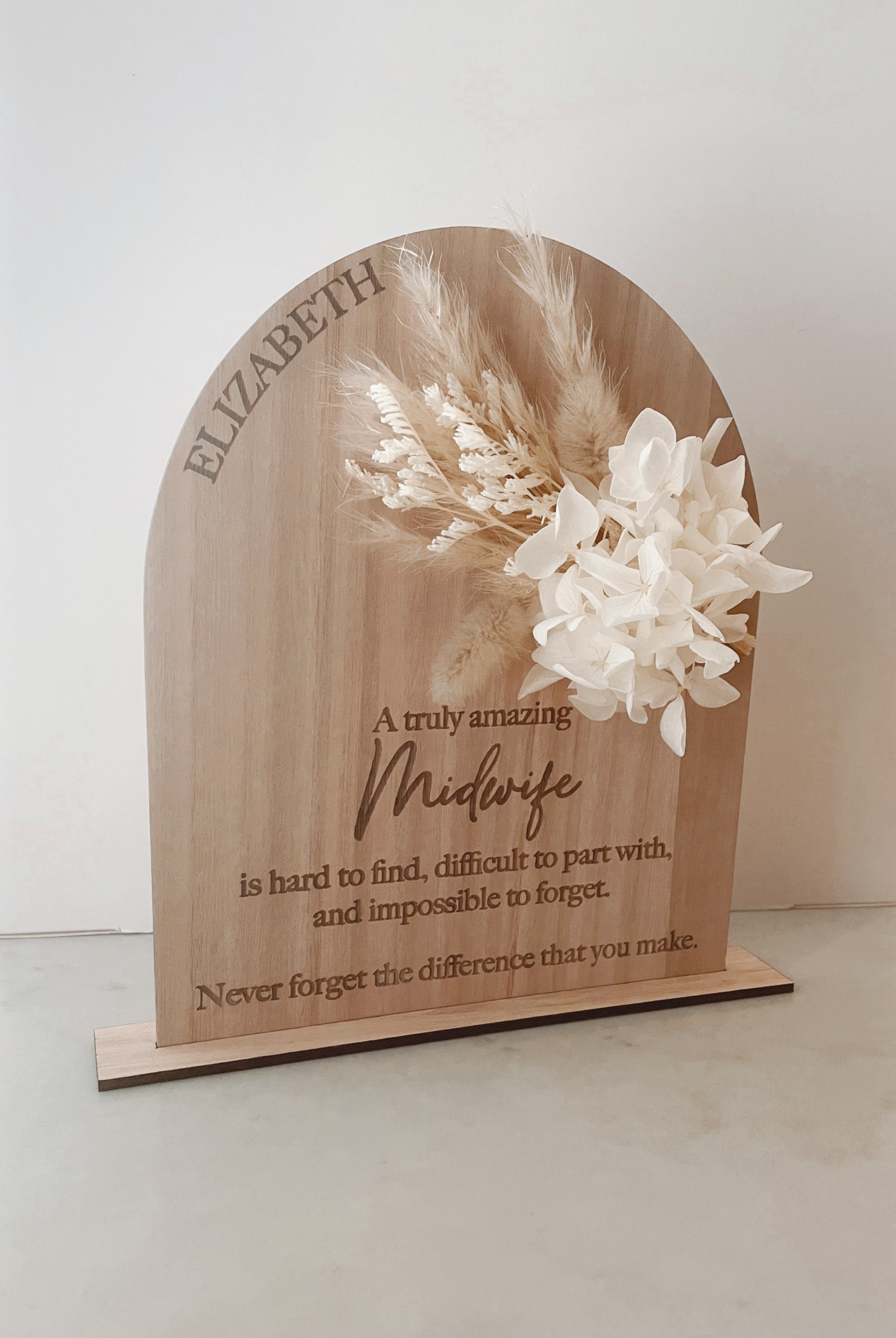 Dried floral wooden plaque with acrylic and/or laser engraved text or name, either arch or round shape, with dried preserved flowers tied to the plaque. Perfect for baby birth announcements or personalised gifts or keepsakes. Midwife gift - nurse gift - doctor gift