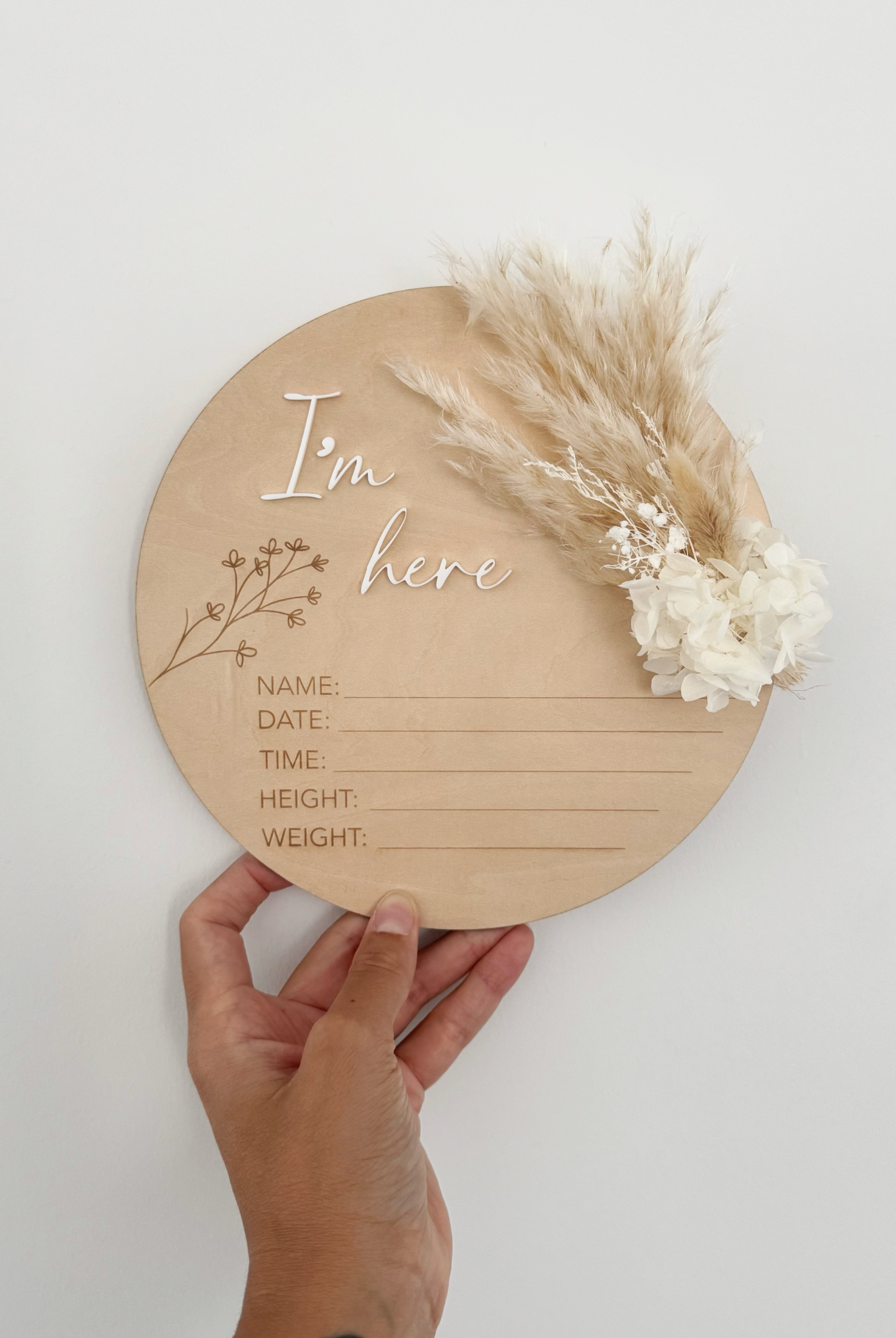 Dried floral wooden plaque with acrylic and/or laser engraved text or name, either arch or round shape, with dried preserved flowers tied to the plaque. Perfect for twin or multiples baby birth announcements or personalised gifts or keepsakes.