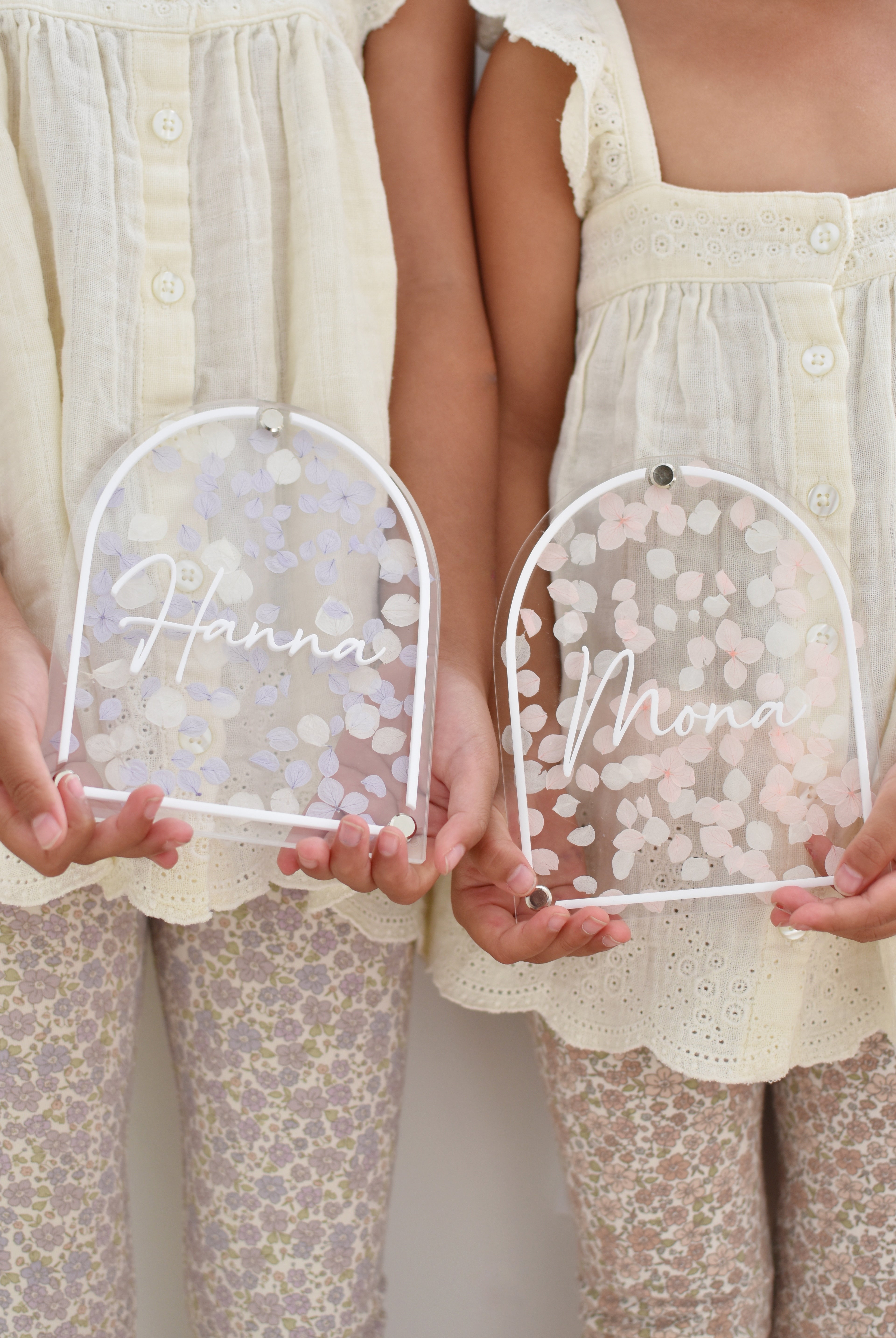 Pressed floral acrylic plaque with dried flower petals pressed between. Acrylic stand optional. Great for personalised gift or birth announcement