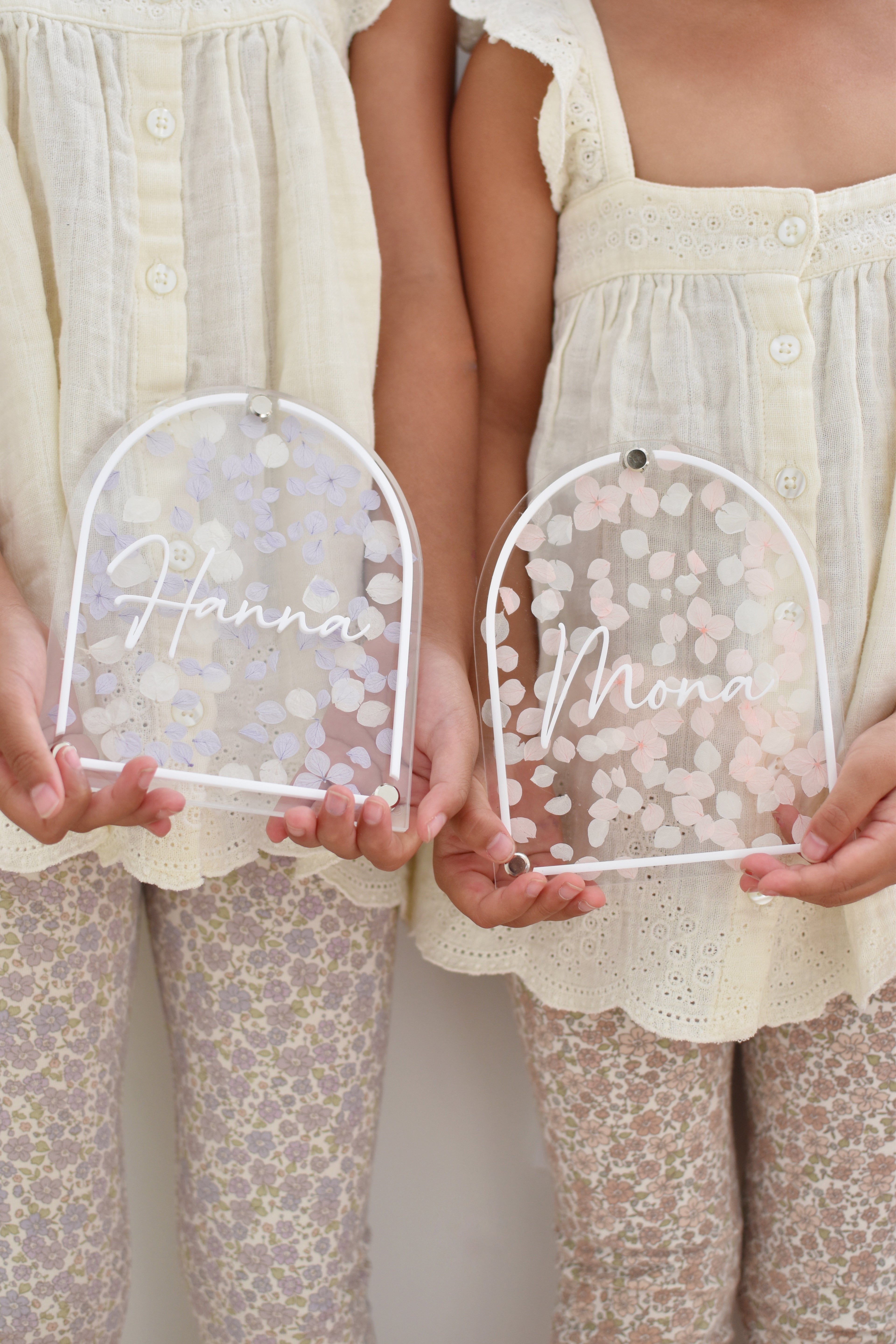 Pressed floral acrylic plaque with dried flower petals pressed between. Acrylic stand optional. Great for personalised gift or birth announcement