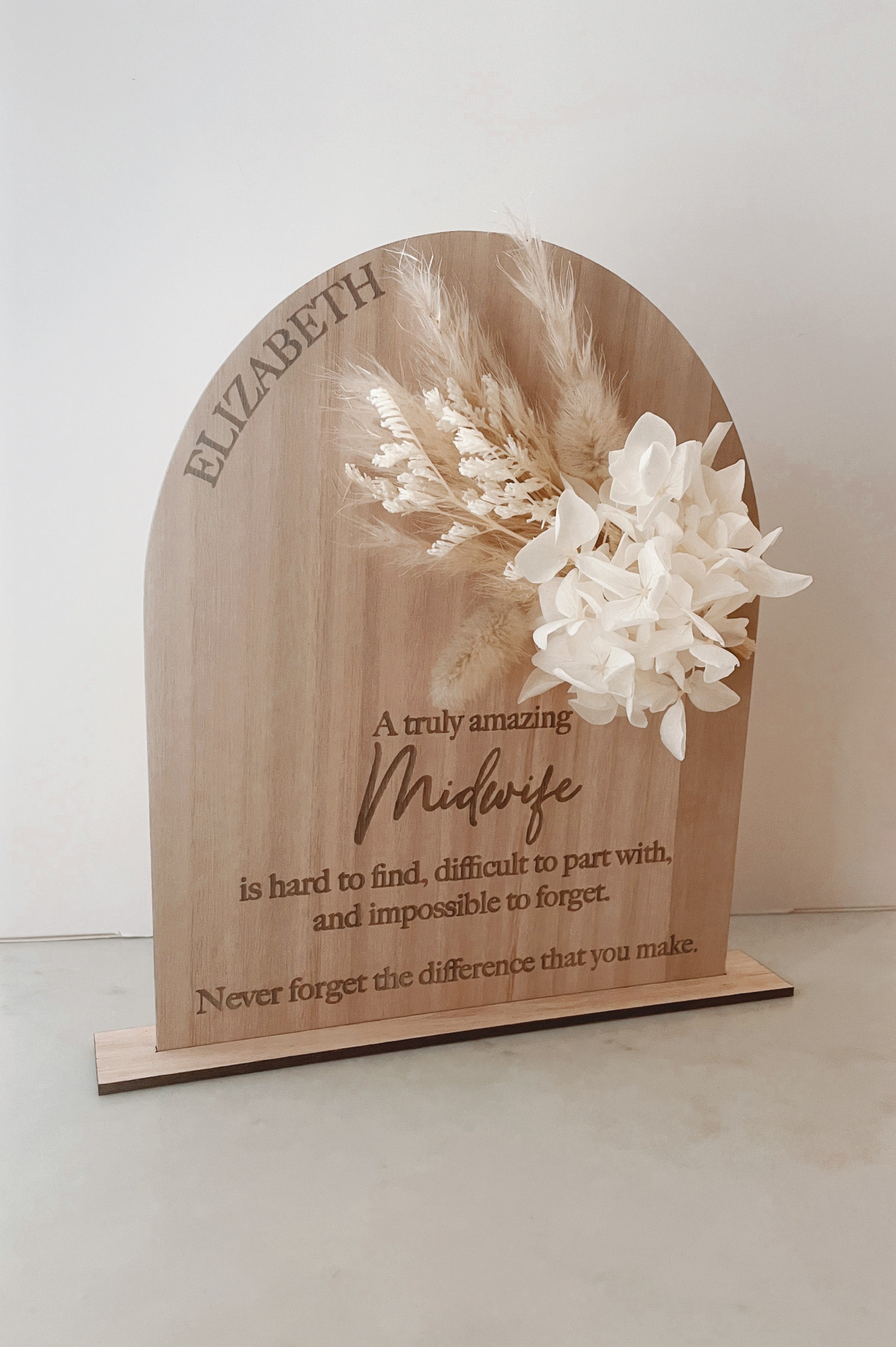 Dried floral wooden plaque with acrylic and/or laser engraved text or name, either arch or round shape, with dried preserved flowers tied to the plaque. Perfect for baby birth announcements or personalised gifts or keepsakes. Midwife gift - nurse gift - doctor gift
